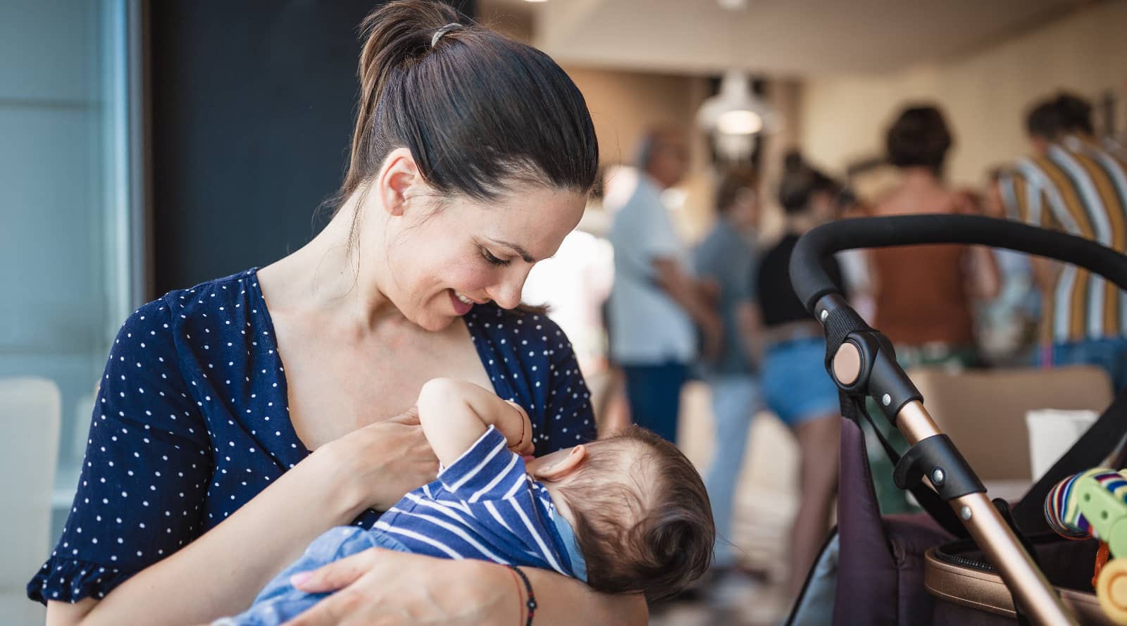 Mother breastfeeding in public