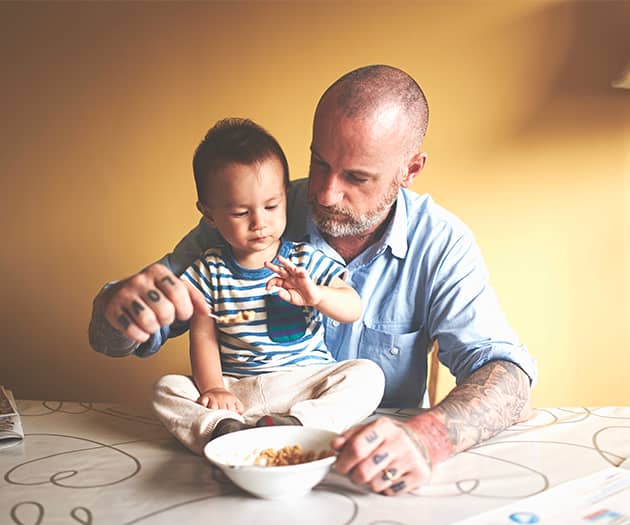 Parent feeding toddler